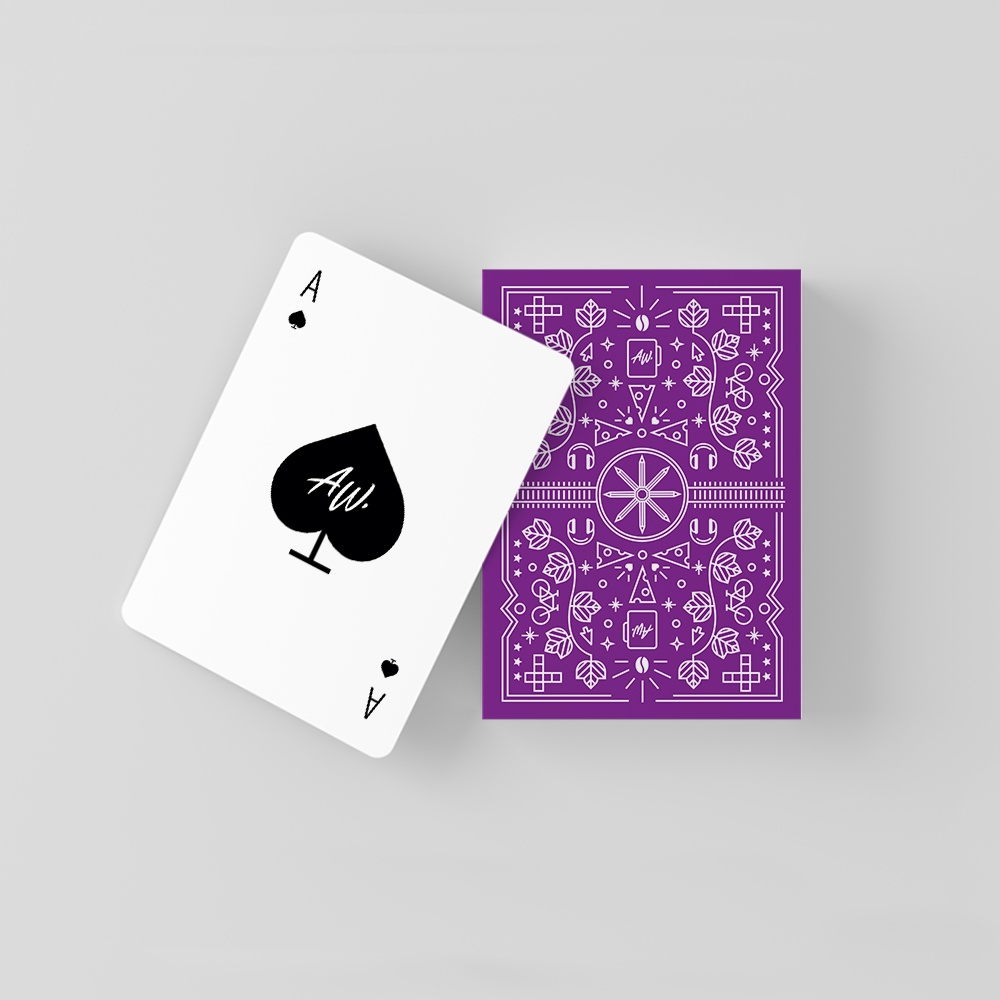 An ace of spades lies on top of another card face-down.